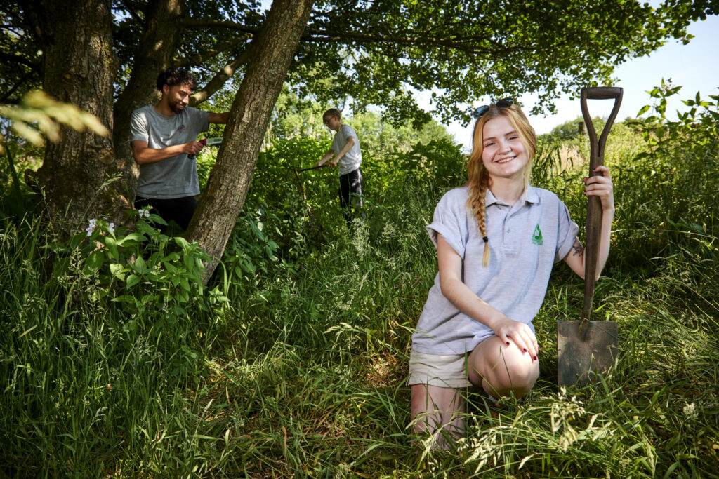 What We Do: Groundwork Cheshire, Lancashire & Merseyside young apprentices, Mia Francis (she) Samuel Gibson (tall grey t-shirt) Billy Hunt (white t-shirt) Sam Phillips (dark blue t-shirt)